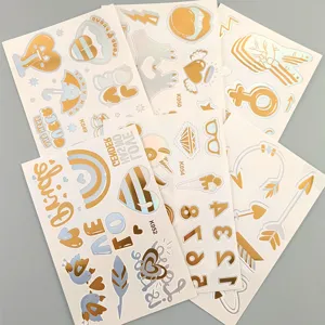 Autocollants de tatouage temporaire dorés au laser, art corporel imperméable pour fête.