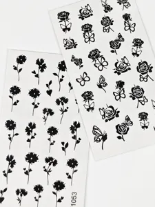 Detailopname van mini zwarte roos en vlinder tijdelijke tatoeage stickers, waterdicht.