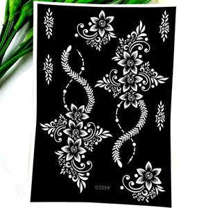 Detailed view of intricate henna style floral and vine tattoo stencil sheet pattern design.