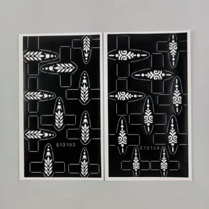Detailed view of Indian style henna tattoo finger stencils, disposable hollow body paint templates.