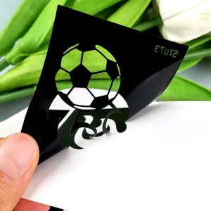 Waterproof black soccer tattoo sticker detail showing hollow tribal football sticker.
