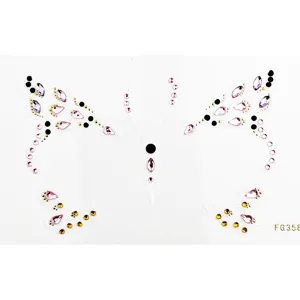 Face rhinestone sticker detail showing pink and purple crystal gems in butterfly shape design.