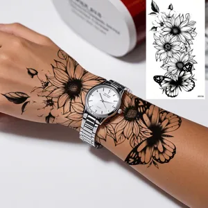 Waterproof temporary tattoo sticker featuring black flower and butterfly for arm art.