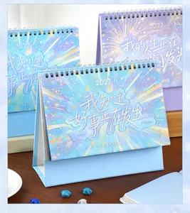 Detailed view of the 2027 cute desktop calendar featuring starry design and inspirational quotes.