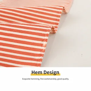 Red white striped cotton linen apron fabric detail view kitchen workwear material piece