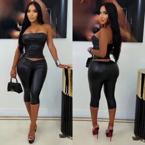 Black faux leather strapless cropped top and leggings two-piece set, sexy slim fit design.
