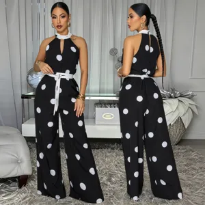 Chic black and white polka dot halter neck sleeveless jumpsuit with belt for women fashion.
