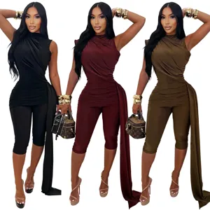 Detail view of the stylish sleeveless ruched jumpsuit in three colors with long draped sash.