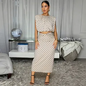 Elegant women polka dot sleeveless crop top and high waist midi skirt matching two piece set