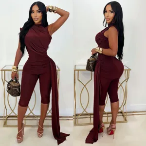 Women elegant sleeveless ruched bodycon jumpsuit featuring chic irregular long side drape.