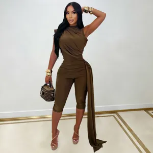 Sleeveless ruched slim jumpsuit detail shot, elegant brown bodysuit with long side sash.