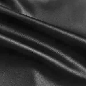 High quality black faux leather fabric texture detail, smooth and durable material for DIY.