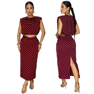 Burgundy polka dot sleeveless crop top and midi skirt stylish two-piece set for women.