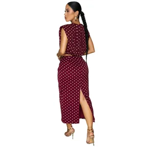 Detailed back view of the women's polka dot sleeveless crop top and midi skirt set.