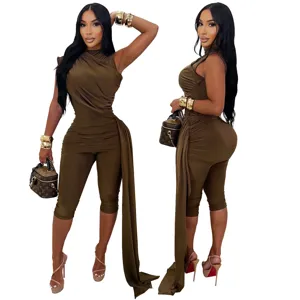 Sleeveless ruched jumpsuit detail showing irregular drape design and slim fit silhouette.