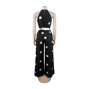 Elegant black and white polka dot halter sleeveless wide leg long jumpsuit for women.