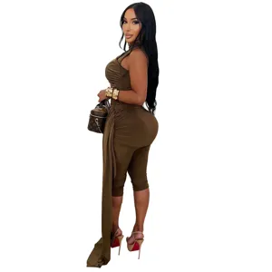 Detailed side view of the stylish sleeveless ruched jumpsuit featuring a chic long drape.