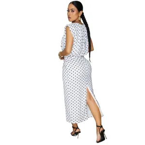 Chic black and white polka dot sleeveless top and midi skirt matching set for women.