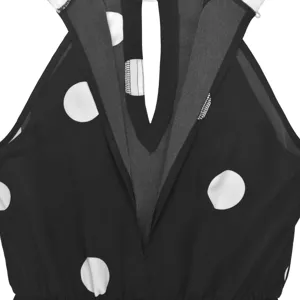 Close-up detail of black and white polka dot halter neck sleeveless jumpsuit design.