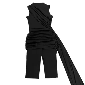 Close-up detail of black sleeveless jumpsuit showing ruched waist and long fashion drape sash.