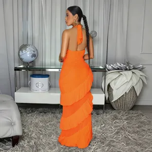 Elegant orange halter backless tiered maxi dress for women, sleeveless summer party gown.