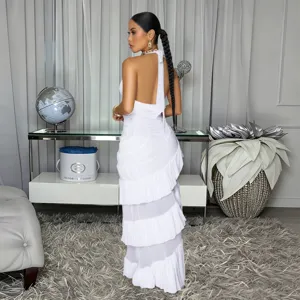 Elegant white backless maxi dress for women, sleeveless tiered ruffle design for summer.