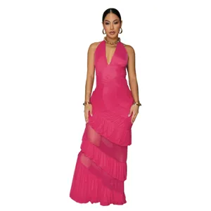 Fuchsia halter neck sleeveless maxi dress, layered ruffles and sheer mesh detail.