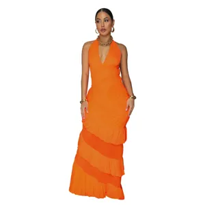 Stunning orange halter neck tiered maxi dress, perfect for summer evening parties and chic wear.