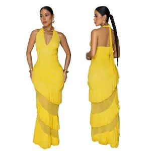 Detailed view of the yellow halter backless tiered maxi dress showing front and back.