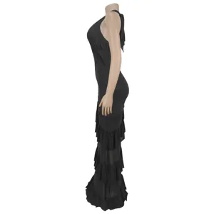 Close-up side view detail of the black sleeveless long dress featuring stylish tiered ruffles.