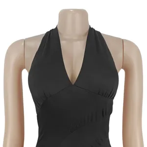 Sleeveless halter backless black dress, elegant casual style detail showing fit and neckline.