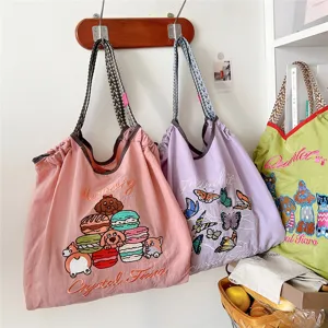 Casual cartoon embroidered tote bag for women, spacious shoulder bag with cute patterns.