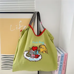 Cute embroidered canvas tote bag, casual large capacity shoulder bag for women daily commute.