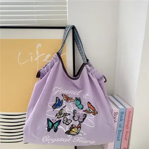 Cute butterfly embroidery canvas tote bag, casual shoulder bag for daily commuting shopping.