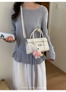 Nische minimalistische Retro Damen kleine quadratische Umhängetasche stilvolle Pendler Tasche