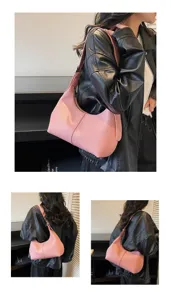 Dettaglio borsa a spalla hobo in pelle rosa, borsa casual alla moda per uso quotidiano.