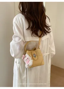 Minimalist yellow bucket bag with cute rabbit plush pendant korean style women shoulder bag