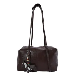 Chic brown Boston shoulder bag for women, large capacity casual commuting crossbody bag style.
