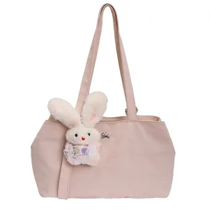 Pink tote bag for women with cute rabbit pendant, large capacity minimalist shoulder bag for work.