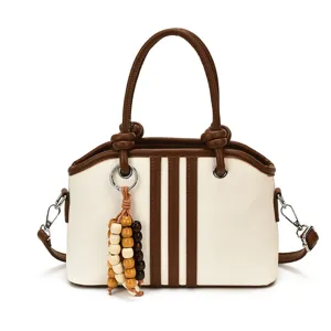 Canvas handbag with brown leather trim, top handle tote bag and crossbody strap for women.