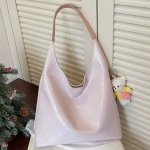 Pink soft leather shoulder bag for women, large capacity casual underarm tote bag daily use.
