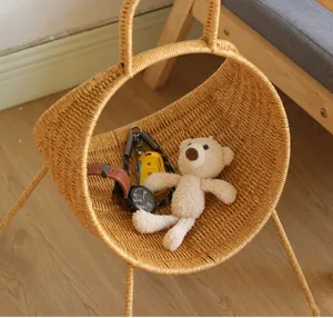 Creative imitation rattan storage basket, desktop organizer for living room, home decor detail.