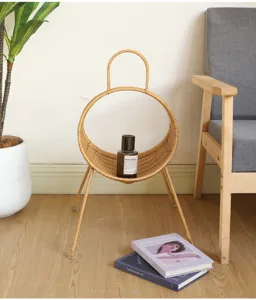 Creative rattan magazine basket detail, stylish wicker storage rack for living room decor.