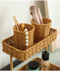 Imitation rattan woven desktop storage organizer with dual holders for makeup brushes and stationery.
