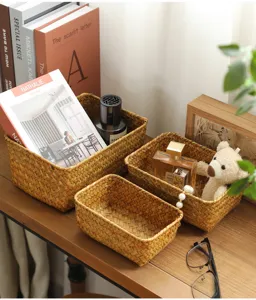 Woven storage basket for desktop snacks and sundries, rectangular straw organizer.
