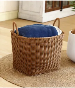 Brown imitation rattan laundry basket with handles for home clothes storage and bathroom organization.