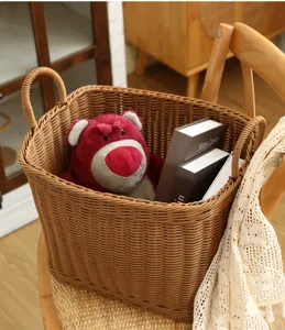 Woven storage basket detail, durable rattan laundry hamper with handles for home organization.
