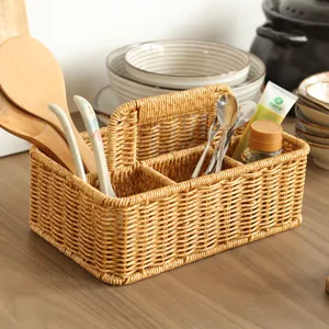 Handwoven imitation rattan storage basket with handle, multi-compartment desktop organizer.