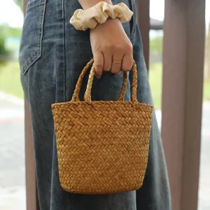 Handmade straw woven handbag mini basket bag perfect for daily use and gift packaging.