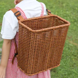 Kids wicker backpack basket for outdoor picking, lightweight woven storage bag with straps.